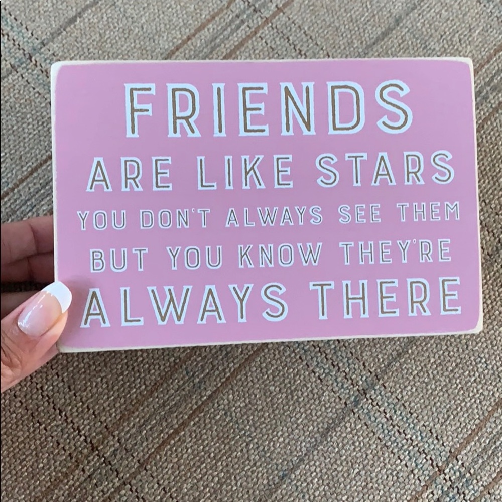 Pink friends sign